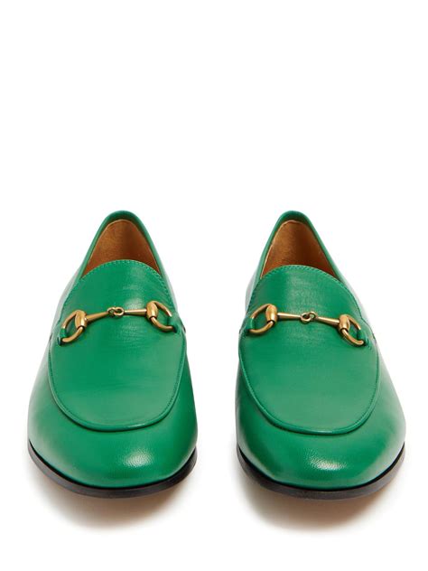 Women's Gucci Jordaan loafer in dark green leather 